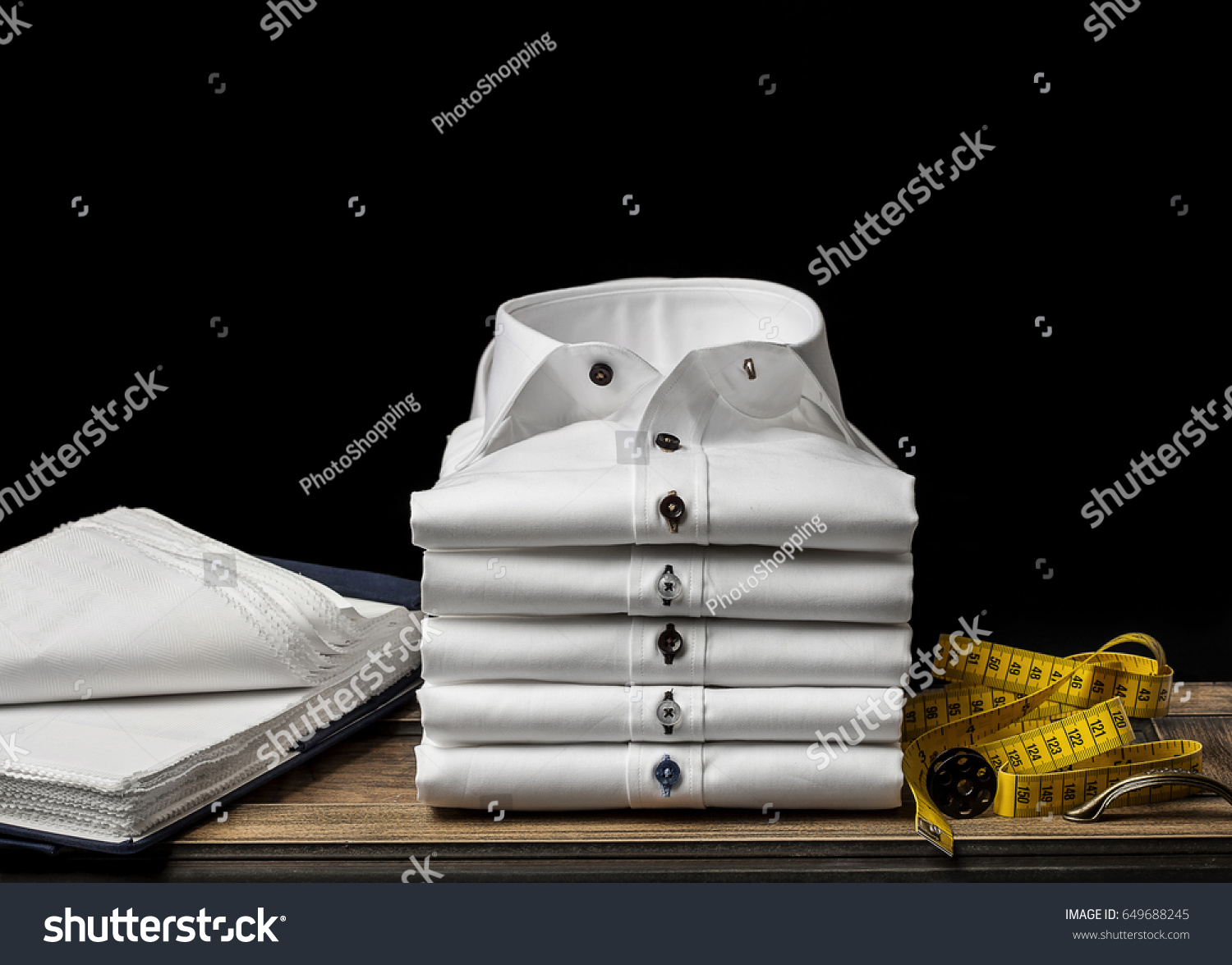 stock-photo-folded-men-s-shirts-649688245