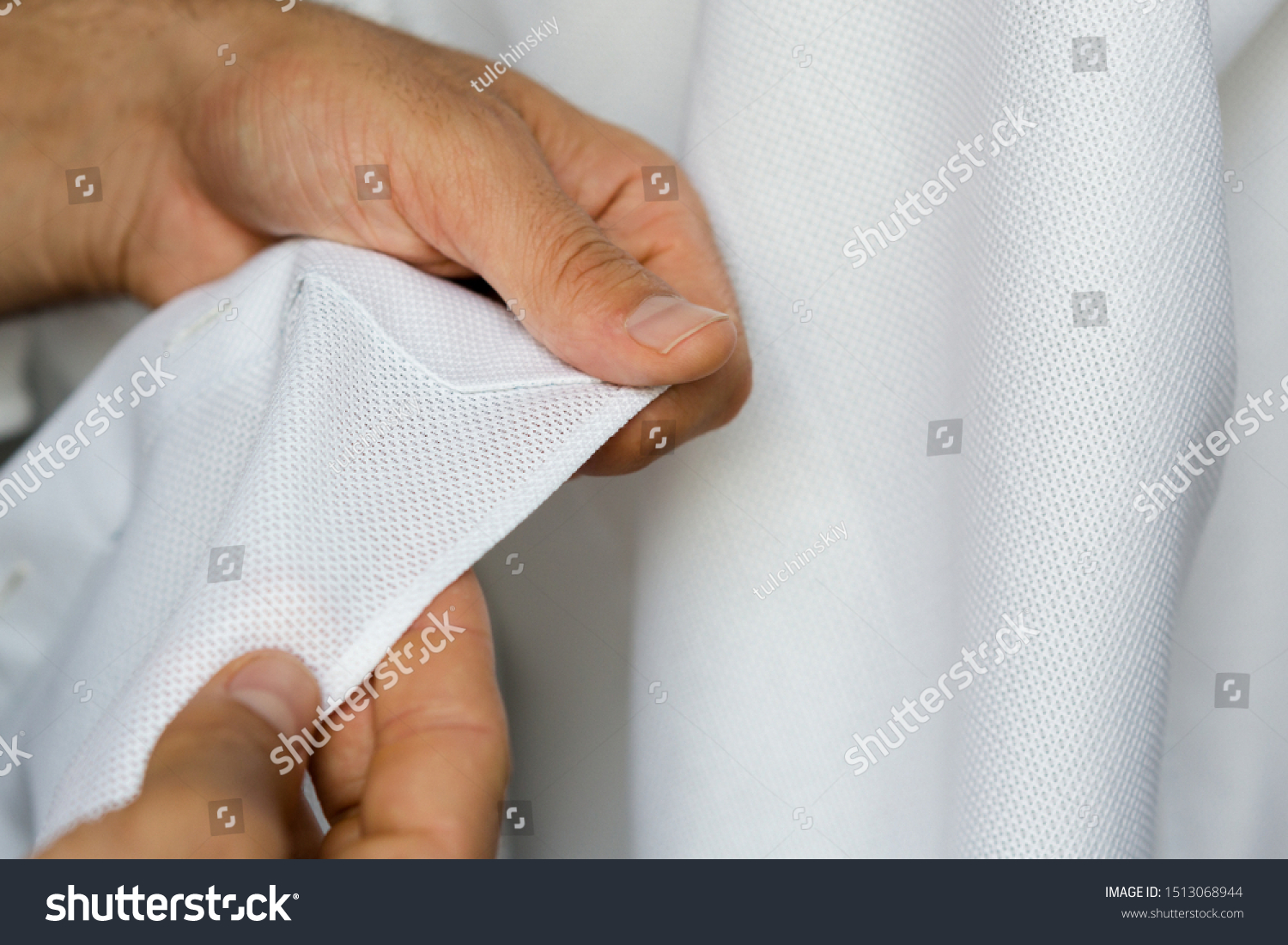 stock-photo-bespoke-white-shirt-hand-stitch-details-close-up-view-1513068944